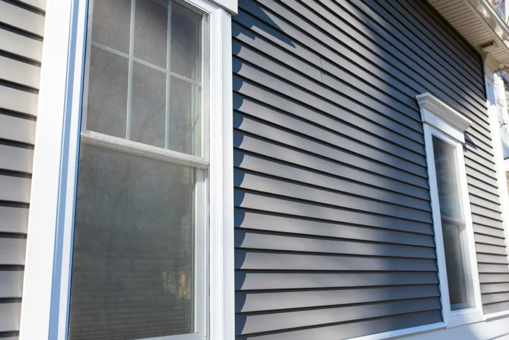 How Long Does Vinyl Siding Last? (When To Replace)